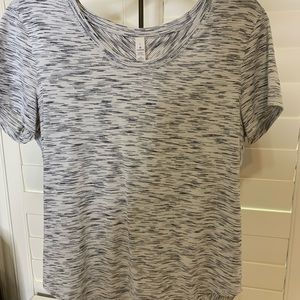 Lululemon  black/ white high low round neck shirt. Great condition worn 1 time